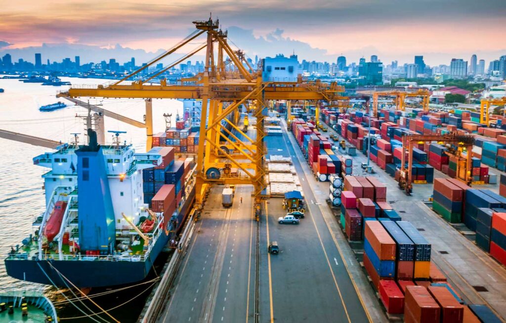 Container ship in dock having freight loaded on it