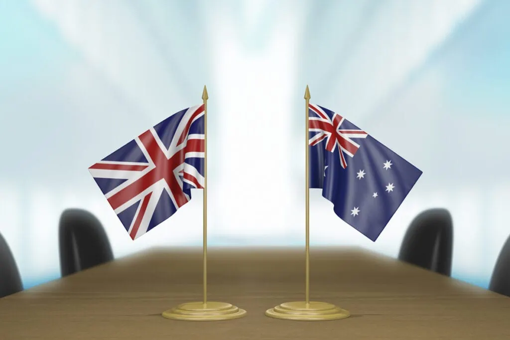 Australian and English flags on a desk