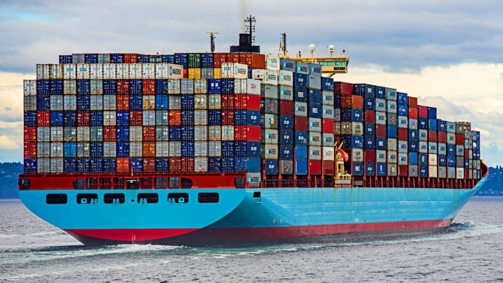 Large container ship at sea full of freight