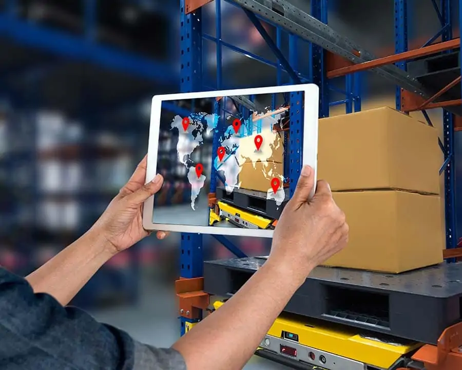 supply chain management graphic on an iPad in a warehouse